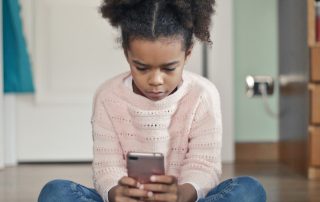 Young girl using smartphone